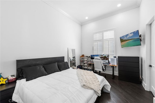 bedroom with baseboards, ornamental molding, dark wood finished floors, and recessed lighting