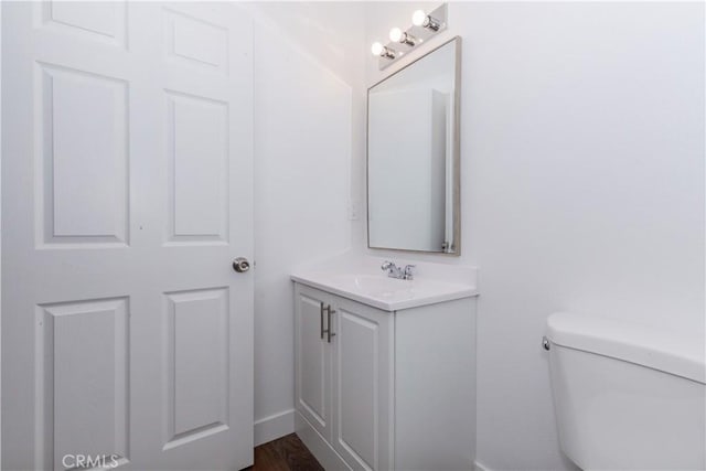 half bath with toilet and vanity