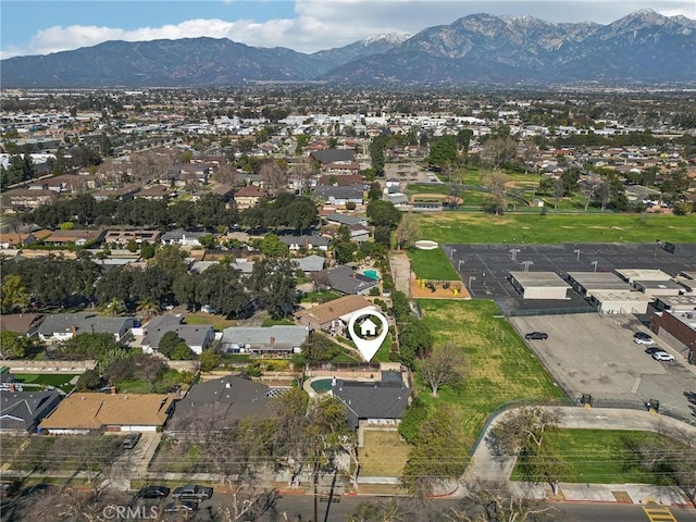 bird's eye view with a residential view and a mountain view