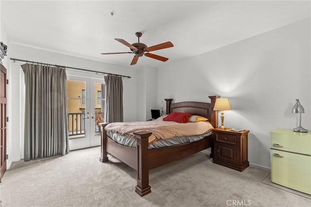 bedroom featuring carpet floors, access to outside, ceiling fan, and french doors