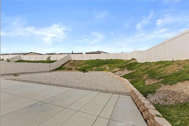 view of patio with a fenced backyard