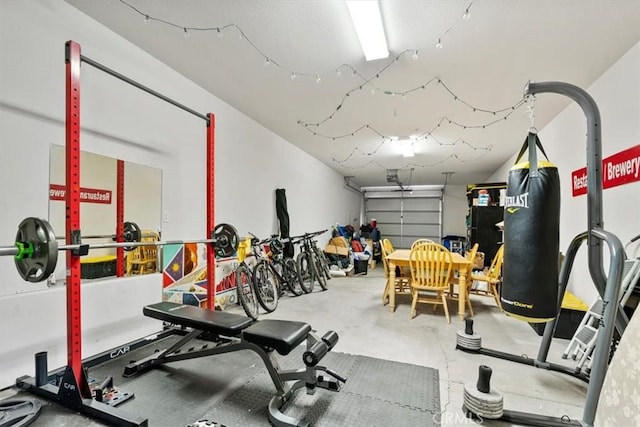 exercise room with a garage