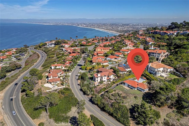 aerial view featuring a water view and a residential view