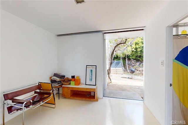 interior space featuring concrete flooring