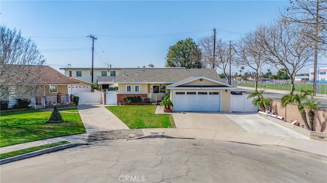 ranch-style house featuring an attached garage, driveway, a front yard, and fence