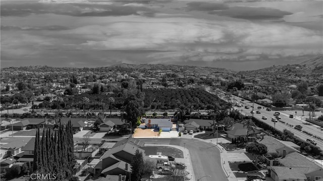 bird's eye view with a mountain view and a residential view