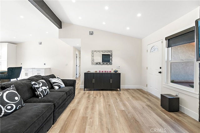 living room featuring visible vents, baseboards, vaulted ceiling with beams, light wood-type flooring, and recessed lighting