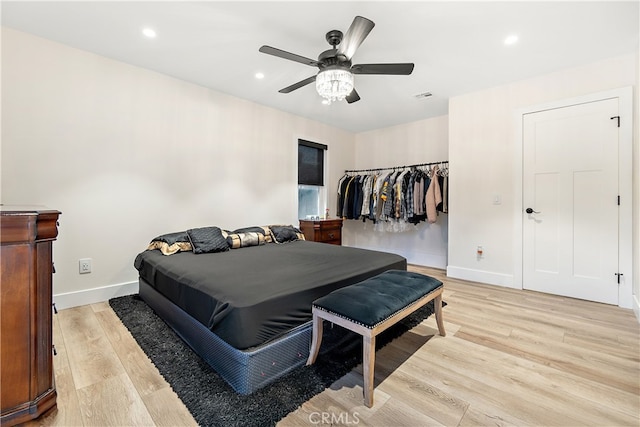 bedroom featuring recessed lighting, baseboards, visible vents, and light wood finished floors