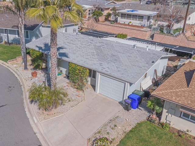 birds eye view of property with a residential view