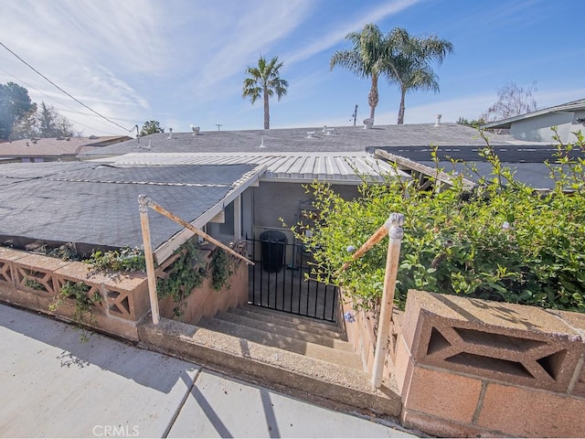 exterior space with metal roof