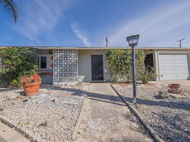 single story home with stucco siding