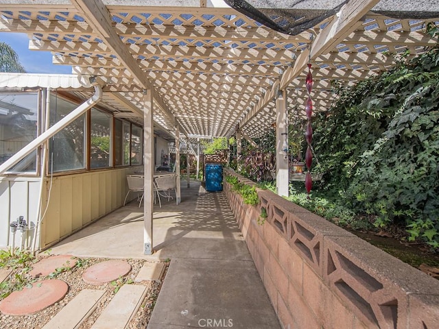 view of patio featuring a pergola