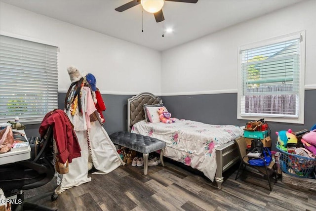 bedroom featuring ceiling fan and wood finished floors