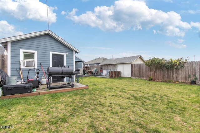 view of yard featuring cooling unit and a fenced backyard