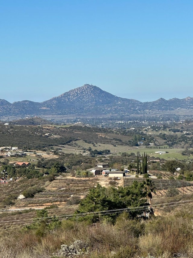 view of mountain feature featuring a rural view