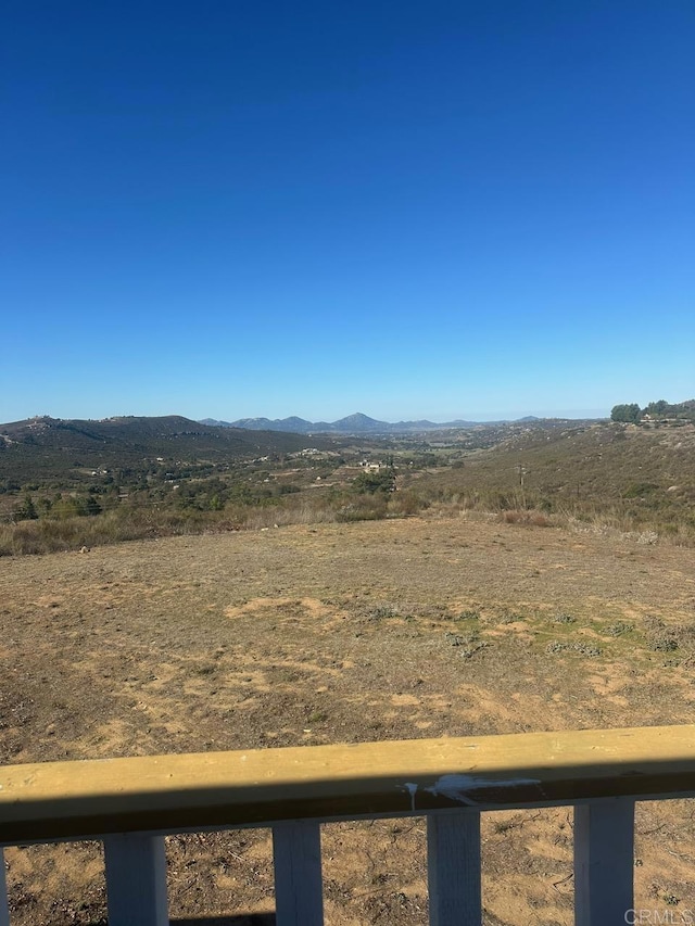 view of mountain feature featuring a rural view