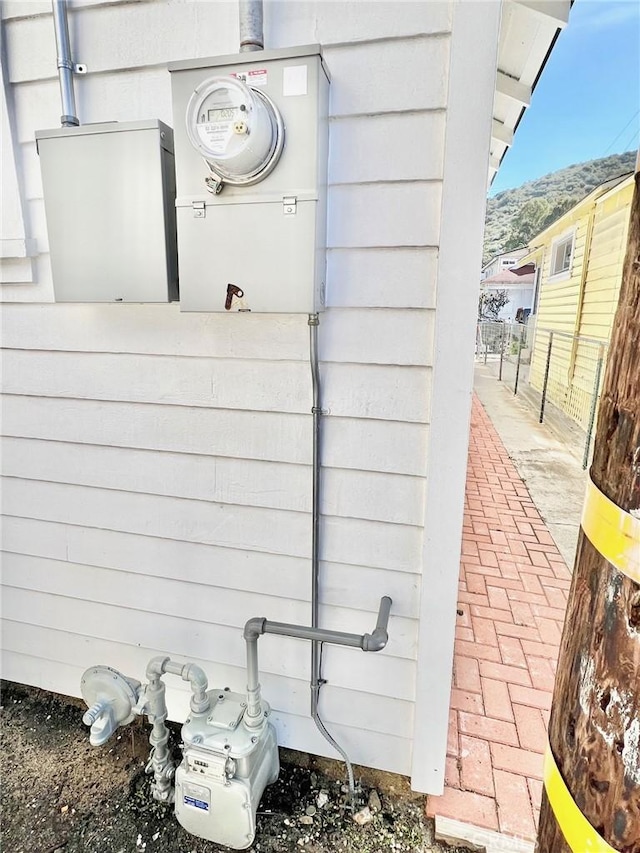 details with gas meter and a mountain view