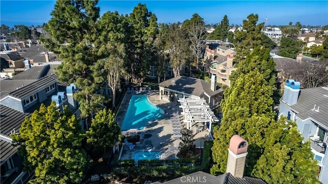 birds eye view of property with a residential view