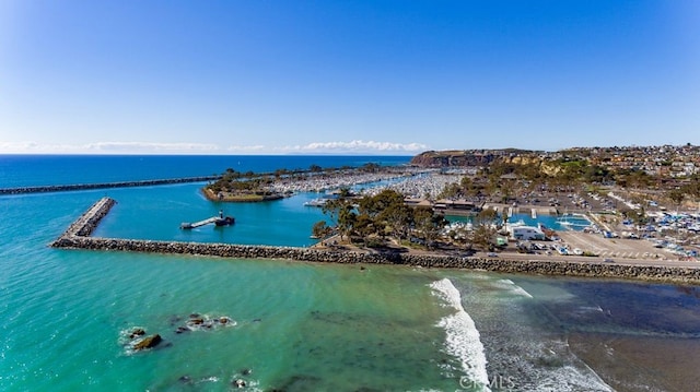 aerial view featuring a water view and a beach view