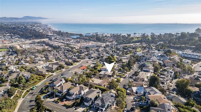 aerial view with a residential view and a water view