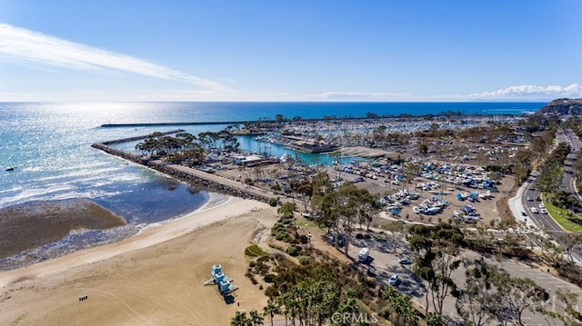 bird's eye view with a view of the beach and a water view