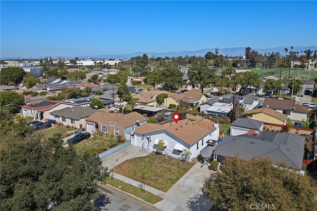 aerial view with a mountain view and a residential view