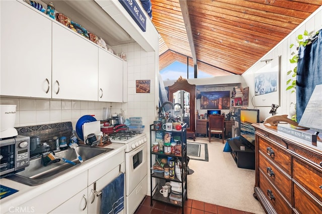 kitchen with white cabinetry, vaulted ceiling, wooden ceiling, decorative backsplash, and white range with gas cooktop