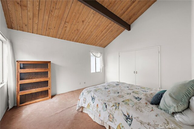 bedroom with wood ceiling, lofted ceiling with beams, and carpet floors