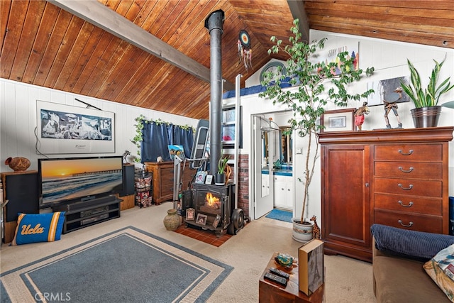 476 62nd St, Newport Beach, CA 92663 - living area featuring a wood stove, wooden ceiling, carpet flooring, vaulted ceiling, and wood walls