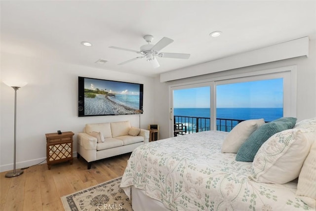 bedroom with baseboards, ceiling fan, wood finished floors, access to outside, and recessed lighting