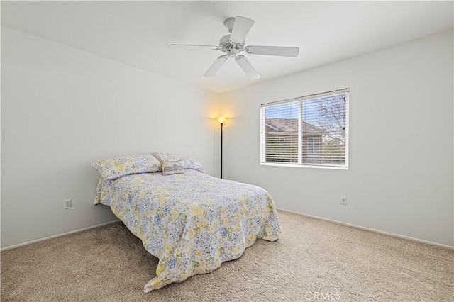 bedroom featuring carpet floors and a ceiling fan