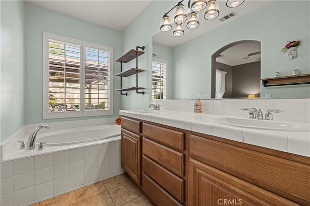 full bathroom with a sink, double vanity, tile patterned flooring, and visible vents