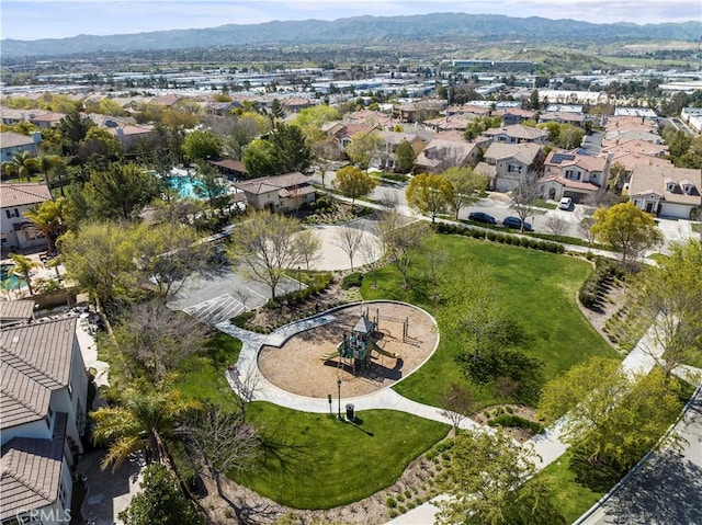 drone / aerial view with a residential view and a mountain view