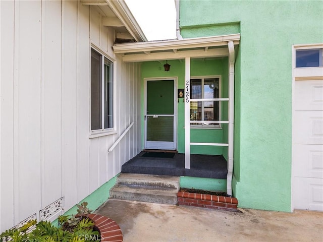 property entrance with a garage