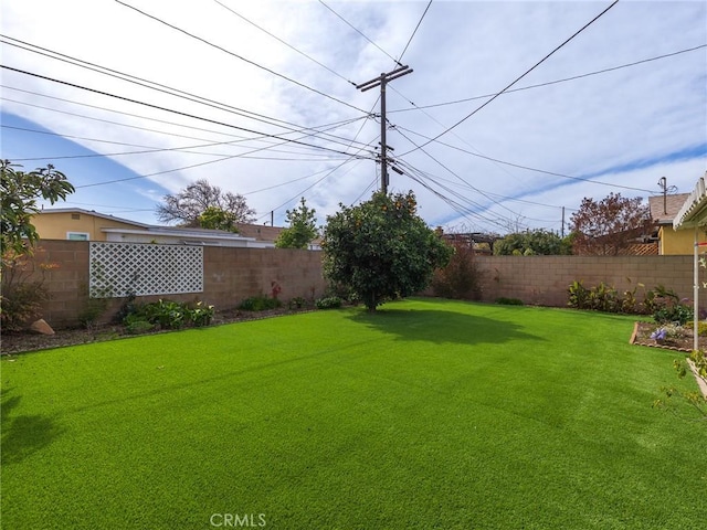 view of yard featuring fence