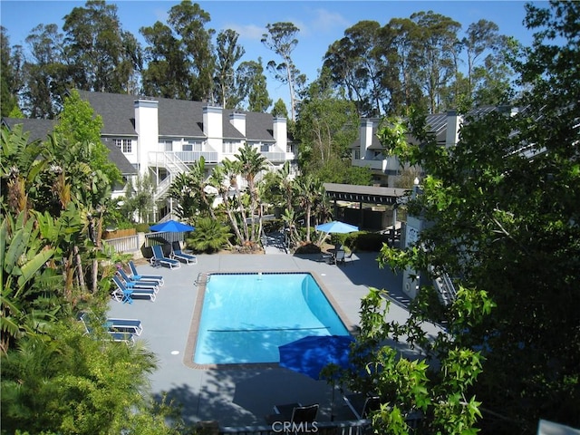 pool with a patio area