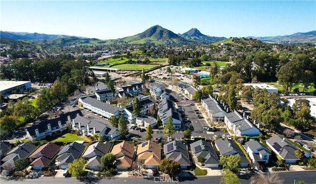 bird's eye view featuring a residential view and a mountain view