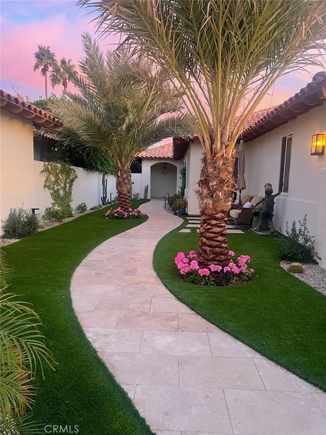 exterior space featuring a patio area and fence