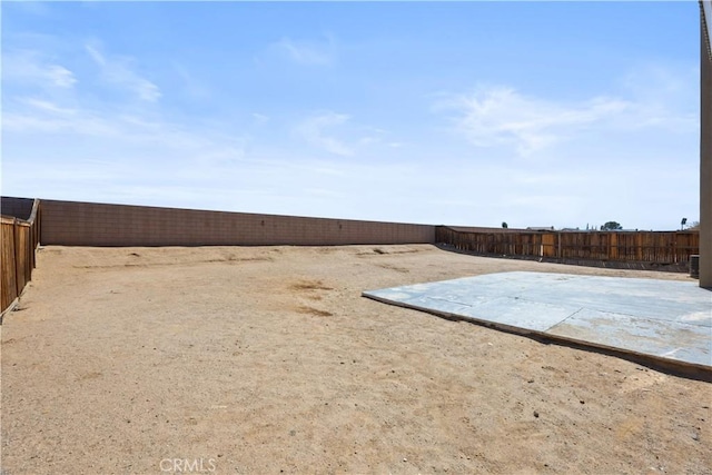 view of yard featuring a fenced backyard