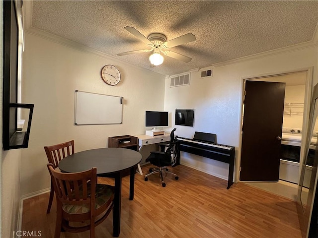 10655 Lemon Ave Unit 3808, Rancho Cucamonga, CA 91737 - home office featuring ornamental molding, a textured ceiling, ceiling fan, and light wood-style flooring