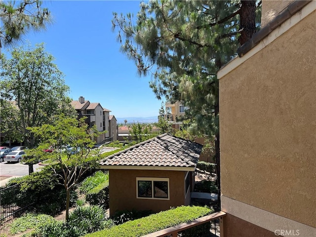 10655 Lemon Ave Unit 3808, Rancho Cucamonga, CA 91737 - view of side of property with a tile roof and stucco siding