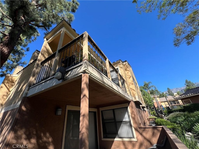 10655 Lemon Ave Unit 3808, Rancho Cucamonga, CA 91737 - back of property featuring a balcony and stucco siding