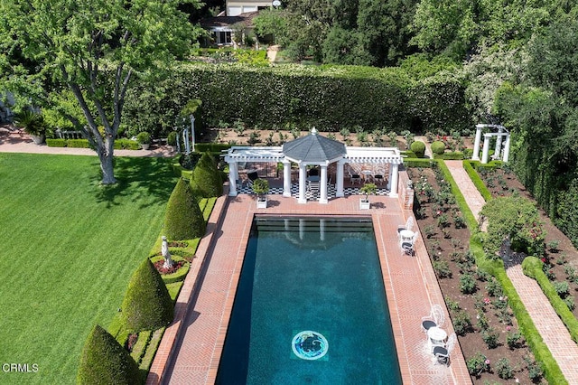 view of pool with a pergola and a gazebo