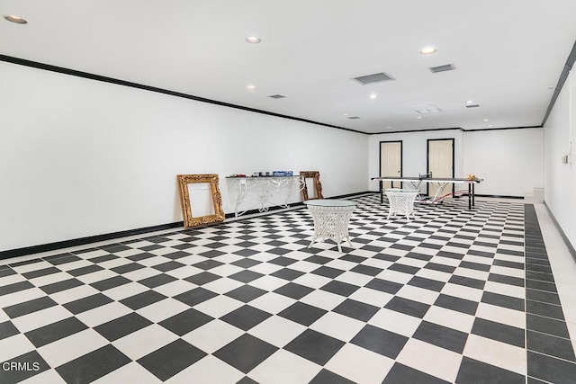 empty room featuring baseboards, ornamental molding, visible vents, and recessed lighting