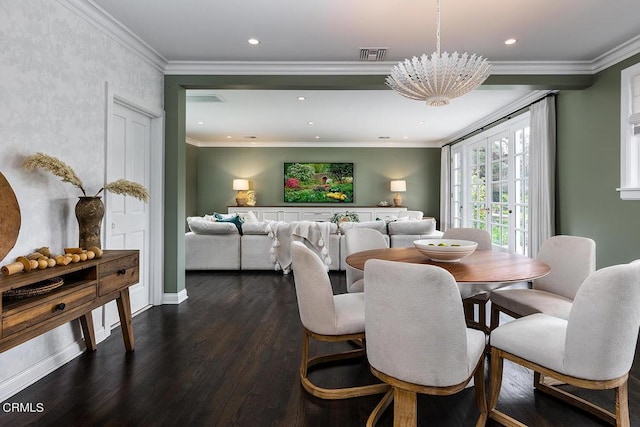 dining room with visible vents, dark wood-style flooring, crown molding, a notable chandelier, and recessed lighting