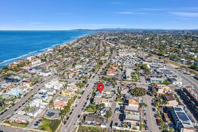 aerial view featuring a water view and a view of the beach