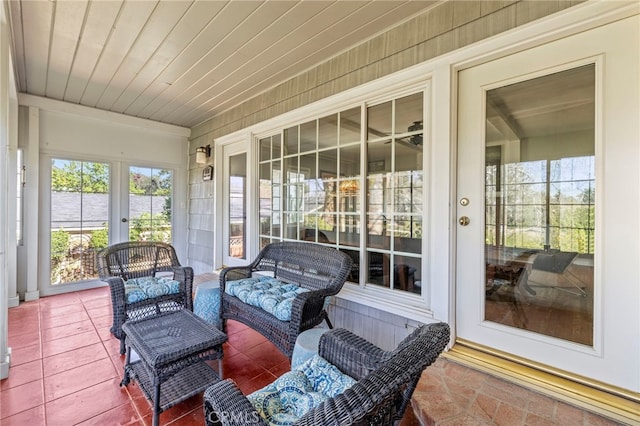 sunroom with wood ceiling