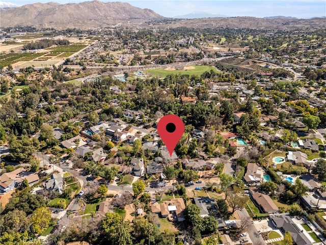 bird's eye view featuring a residential view and a mountain view