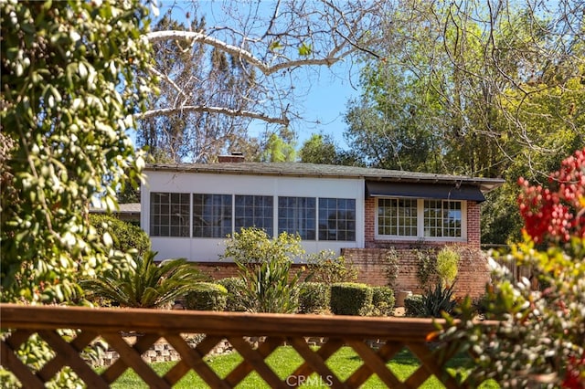 view of front of property with brick siding