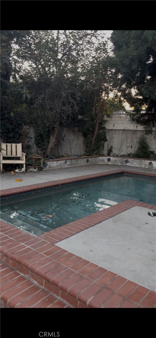 outdoor pool with fence